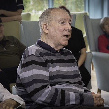 a care home resident singing along to the song